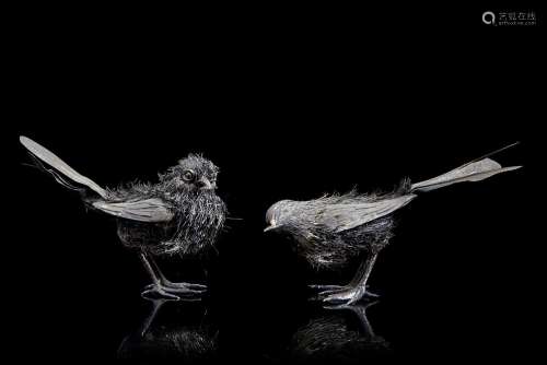 A pair of silver and vermeil birds. Silversmith Buccellati (...