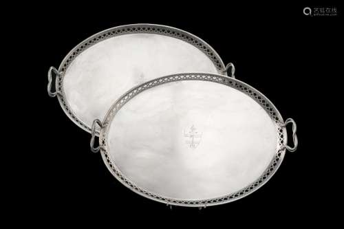 A 19th-century pair of silver double-handled trays. Engraved...