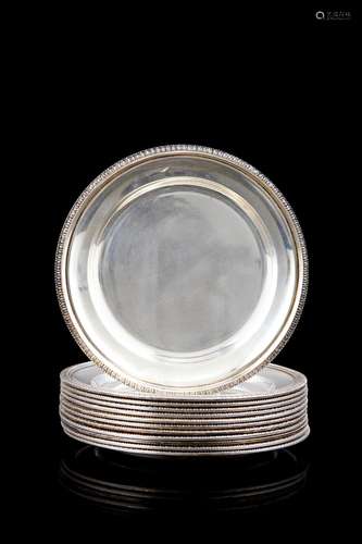 A group of twelve silver coasters. Titled 800, silversmith R...