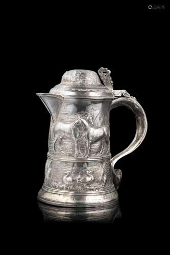 An embossed silver tankard dated and dedicated. London, 1885...