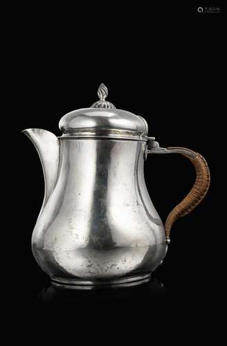 A 19th-century Venetian silver coffe pot with wicker covered...