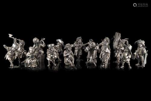 A group of fourteen silver sculptures representing popular c...