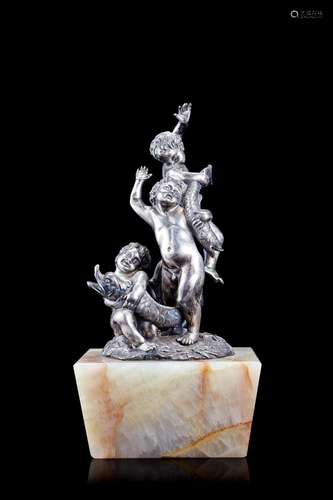 Martignetti, a silver sculpture representing "Puttos an...