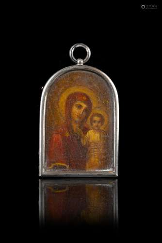 A 19th-century Russian icon depicting Madonna and child. Sil...