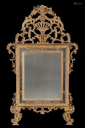 An 18th-century Piedmont carved and lacquered wood mirror de...