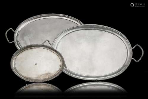 A 19th-century group of three silver trays, two are double-h...