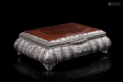 A chiselled silver jewelry box. Tortoiseshell cover, vermeil...