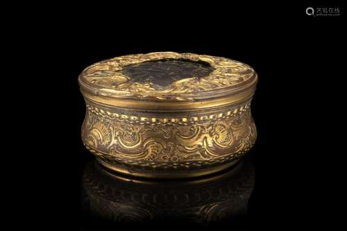A 19th-century chiselled gilt metal box with a horn-plated l...