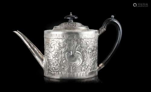 A silver teapot with an ebonized wooden handle. London, 1795...