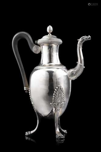 A French 19th-century silver coffe pot with ebonized handle....