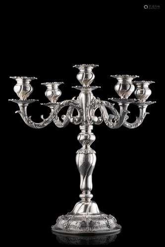 A chiselled silver five-light candelabra. Titled 800 (g 2200...