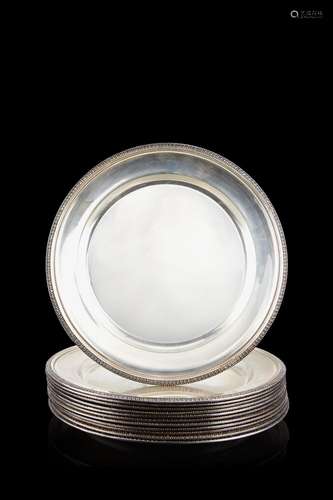 A group of twelve silver saucers. Titled 800. R. Miracoli si...