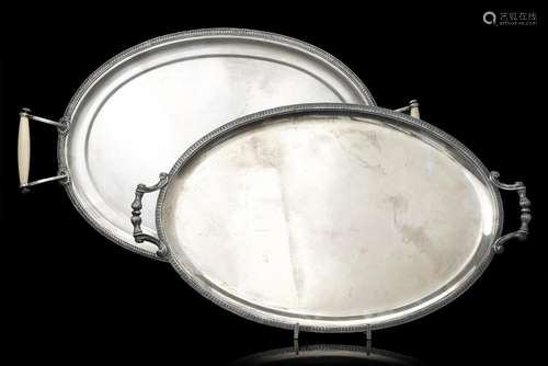 A lor comprising two silver double-handled trays, one with i...