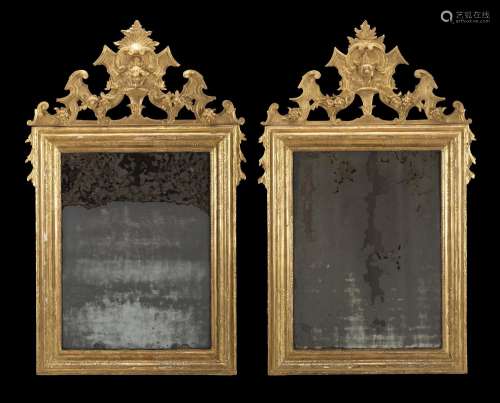 Two antique carved gilt-wooden mirrors (cm 148x89) (defects ...