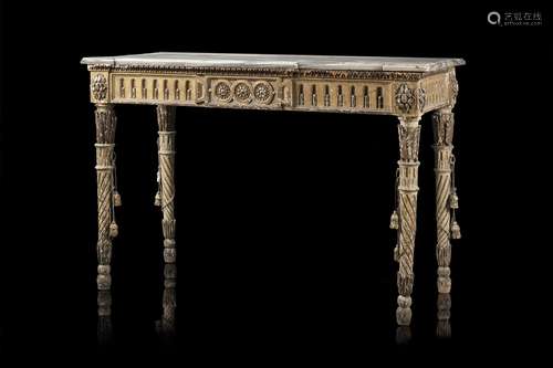 An 18th-century carved lacquered and partially gilt wooden t...