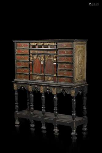 A 19th-century ebonized wood and tortoise-shell veneered and...