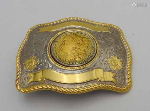 A DECORATIVE AMERICAN BELT BUCKLE SET WITH A DOLLAR COIN MED...