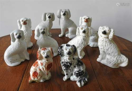 FOUR PAIRS OF VICTORIAN STAFFORDSHIRE SPANIELS AND TWO OTHER...