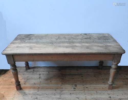 A WAXED PINE RUSTIC FARMHOUSE TABLE, on turned legs 78 x 180...