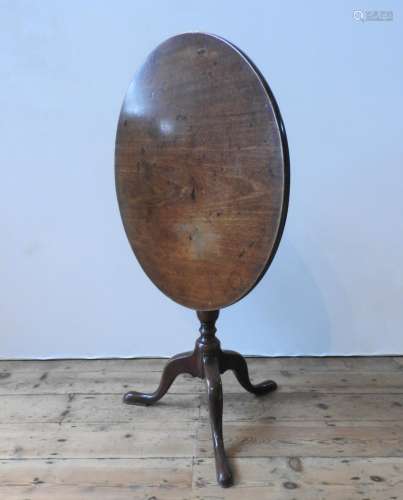 A VICTORIAN MAHOGANY TILT-TOP TRIPOD TABLE, with a solid one...