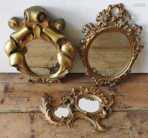 A 19TH CENTURY SCROLL DECORATED GILT MIRROR, SWAG DECORATED ...