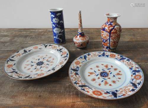 A PAIR OF IMARI PLATES, BOTTLE VASE AND TWO OTHER VASES, the...