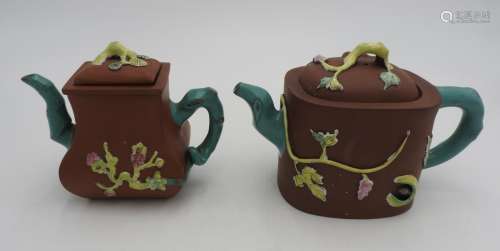 TWO CHINESE FAMILLE-ROSE YIXING POTTERY TEAPOTS 20TH CENTURY...