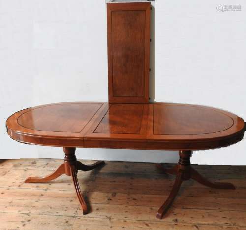 A 20TH CENTURY ANGLO-CHINESE ROSEWOOD EXTENDING DINING TABLE...
