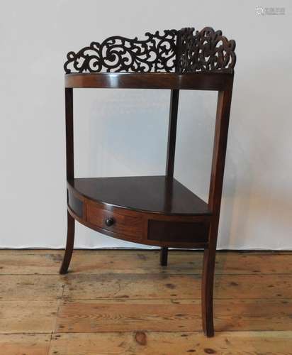 A 20TH CENTURY MAHOGANY CORNER WASHSTAND, with carved fret w...