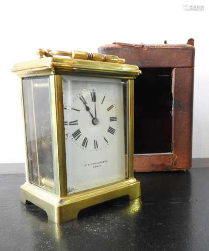 A FRENCH BRASS CARRIAGE CLOCK WITH CARRY CASE AND KEY, inscr...