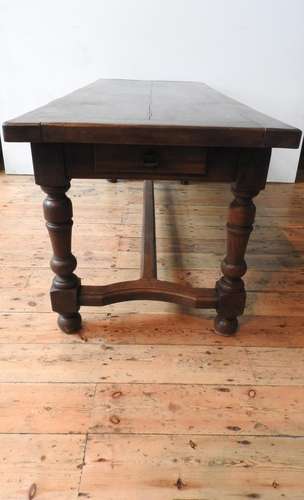 A 19TH CENTURY FRENCH OAK FARMHOUSE TABLE ON TURNED LEGS