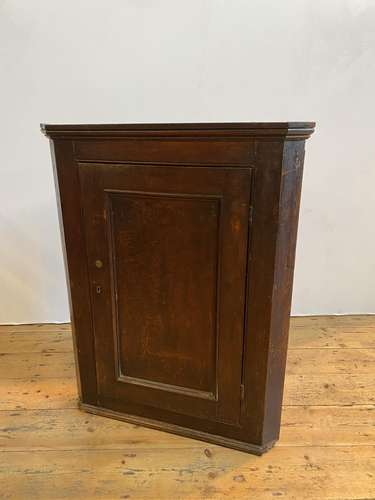 ANTIQUE OAK PANELLED CORNER CUPBOARD, 74cm wide, 94cm high