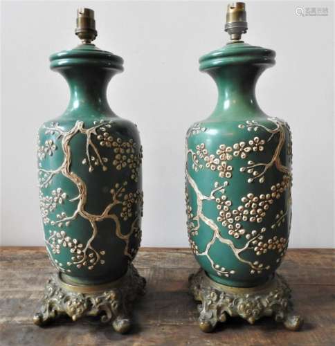 A PAIR OF 19th CENTURY CHINESE GREEN GLAZED TABLE LAMPS, EMB...
