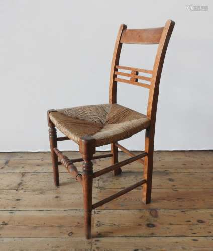A RUSTIC RUSH SEAT SINGLE COUNTRY CHAIR