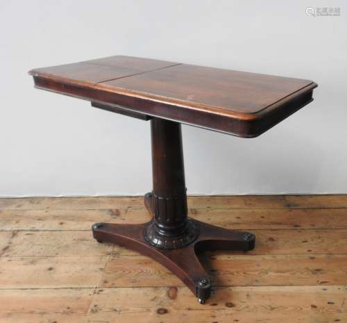 A VICTORIAN MAHOGANY TABLE WITH TWO WRITING SLOPE SECTIONS, ...