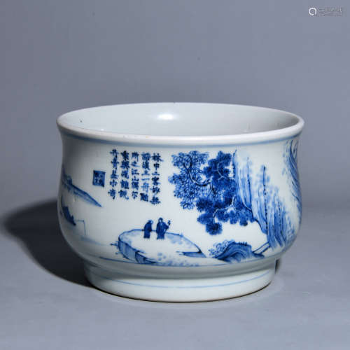 A BLUE AND WHITE INCENSE BURNER PAINTED WITH MOUNTAINS AND R...