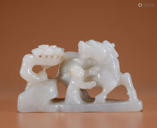 A WHITE JADE ORNAMENT