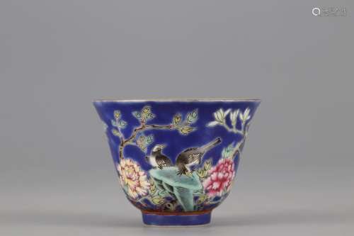 A POWDER ENAMEL CUP PAINTED WITH FLOWERS