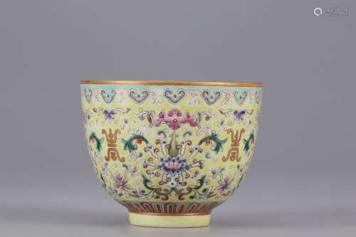 A POWDER ENAMEL CUP PAINTED WITH FLOWERS