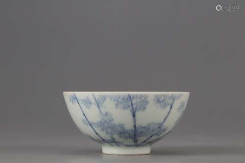 A BLUE AND WHITE BOWL WITH BAMBOO PATTERNS