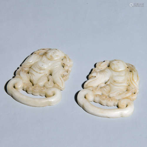 A PAIR OF JADE PENDANTS SHAPED WITH CHARACTERS