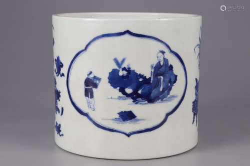 A BLUE AND WHITE BRUSH POT PAINTED WITH FLOWERS