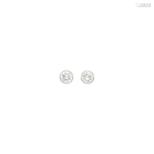 Pair of White Gold and Diamond Stud Earrings