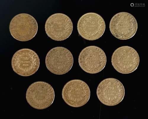 Onze pièces de 20 francs or Napoléon III, 1856 A (x4), 1857 ...