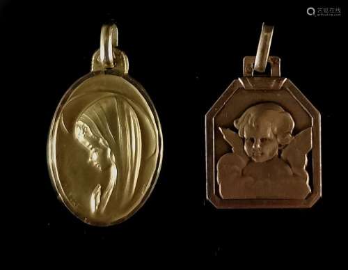 Deux médailles religieuses figurant la Vierge et un ange. L'...