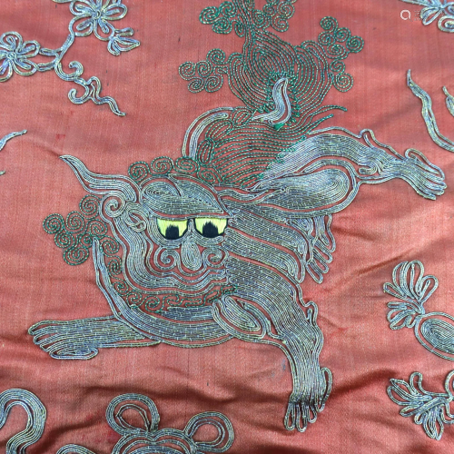 A deep terracotta Chinese silk panel, em