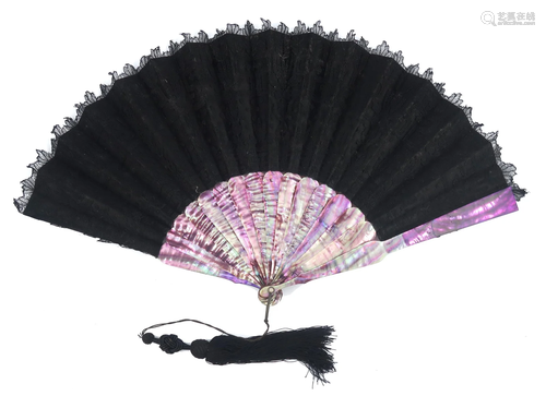 A c 1870â€™s black lace fan mounted on Mot