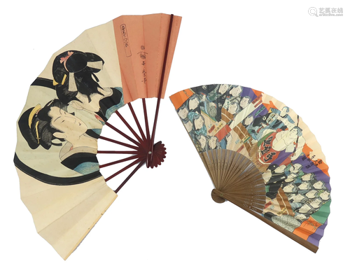 Two colourful Japanese paper fans, one s