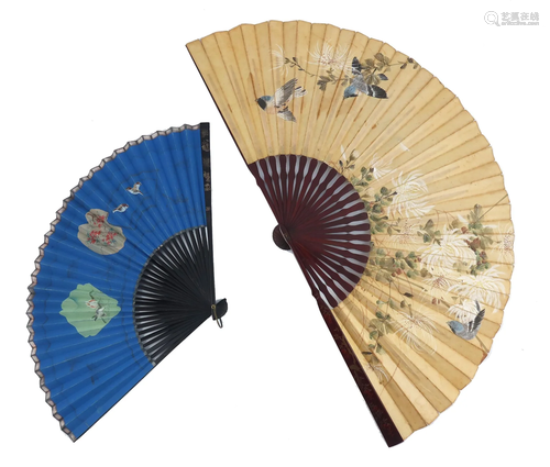 Two large Chinese paper fans, both with