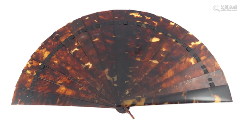 A simple tortoiseshell brisÃ© fan, the gu